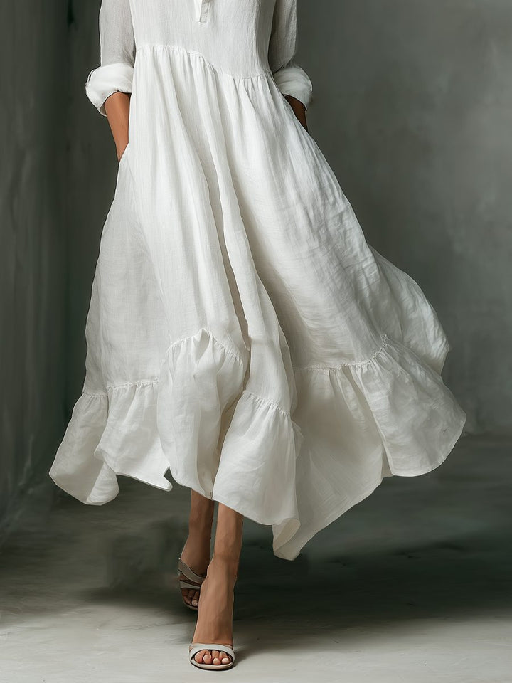 Casual women's long maxi shirt dress with a full button front and fashionable ruffle hem, a comfortable outfit.
