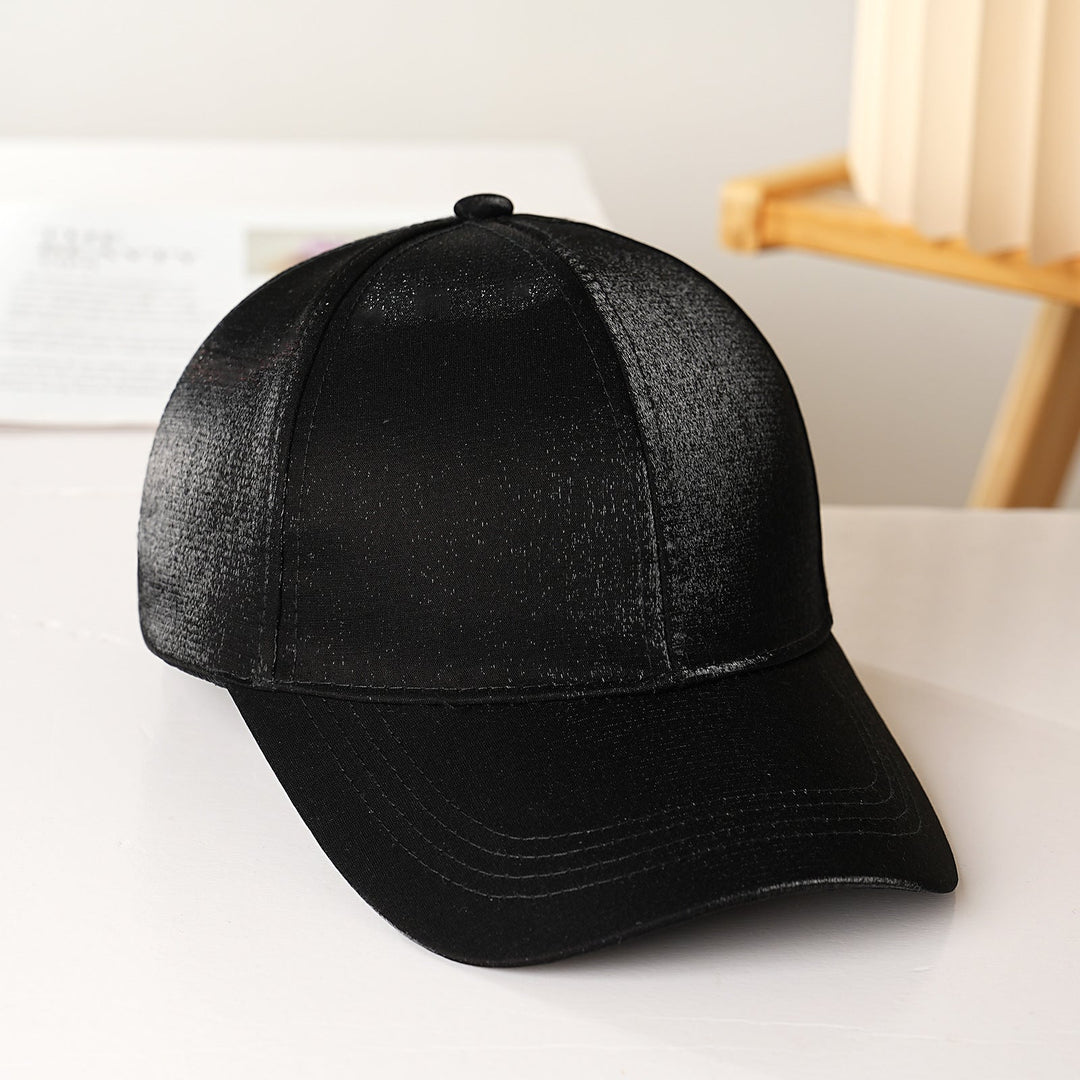 White adjustable satin baseball cap for women, a comfortable and chic summer hat for all occasions.