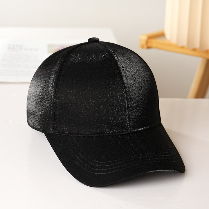 White adjustable satin baseball cap for women, a comfortable and chic summer hat for all occasions.