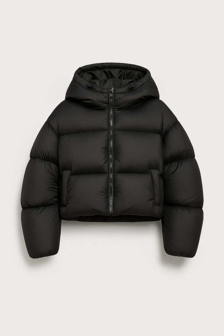 Stylish women's short puffer jacket with hood for warmth. Ideal casual winter outerwear.
