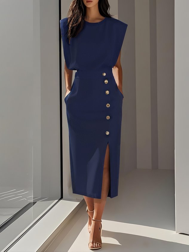 Chic women's workwear sleeveless midi dress, detailed with elegant side buttons & modern cut.