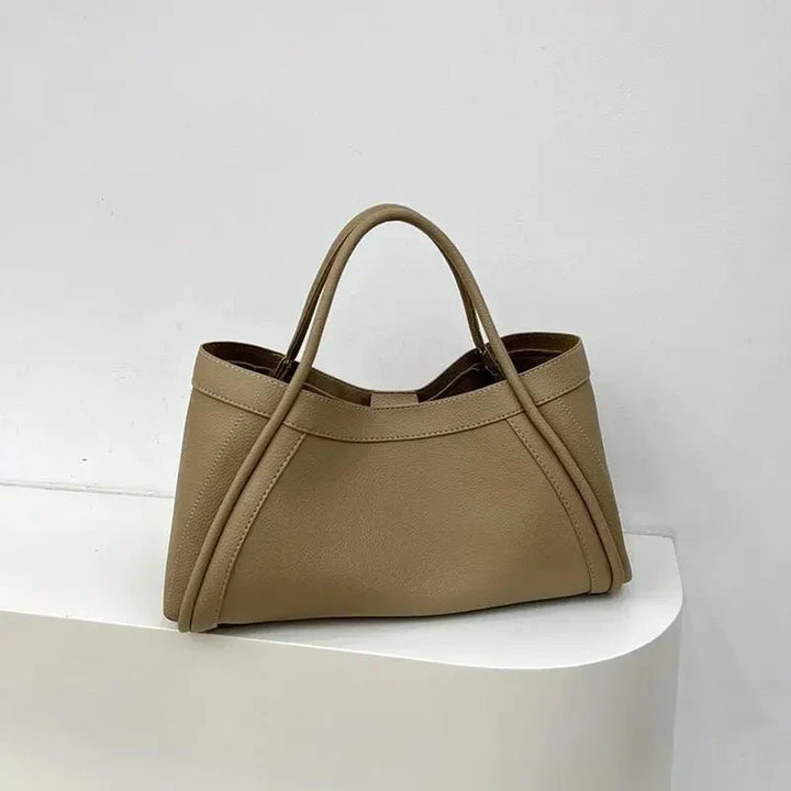 Versatile large capacity women's tote bag, ideal as an everyday shoulder bag or a professional work tote.