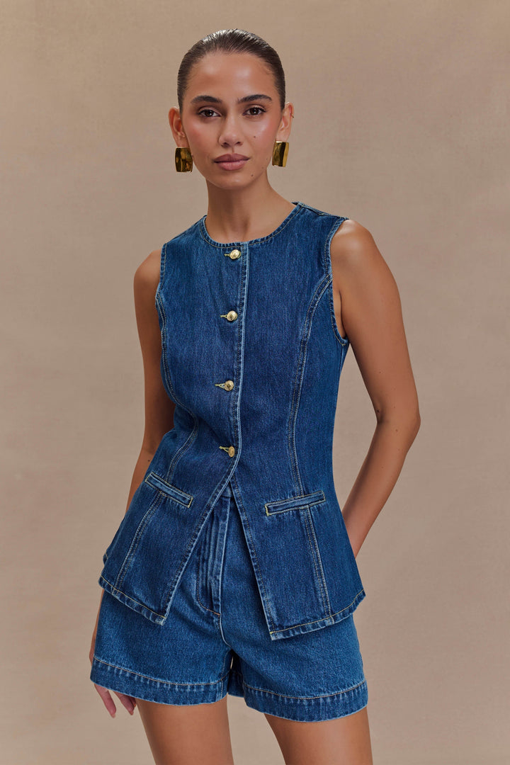 Stylish women's two-piece set featuring a sleeveless top and high-waist shorts, perfect for summer casual wear.