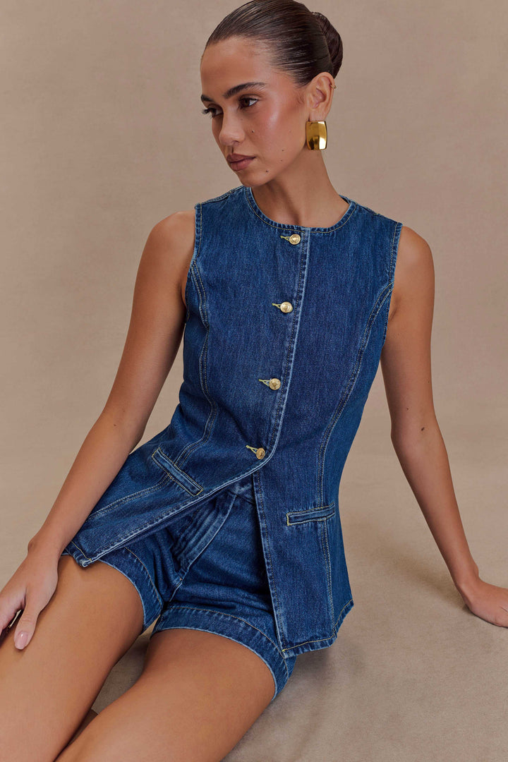 Fashionable women's two-piece summer outfit: a chic sleeveless top paired with comfy high-waist shorts.