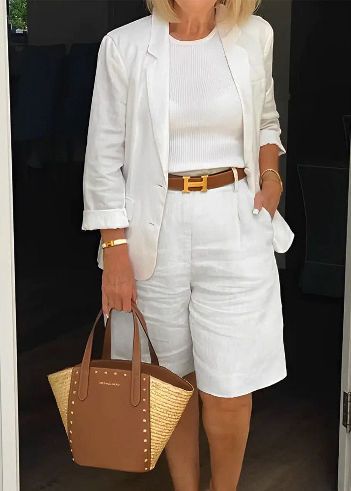 Stylish women's two-piece set: tailored blazer & knee shorts. Perfect for smart casual spring & summer outfits.