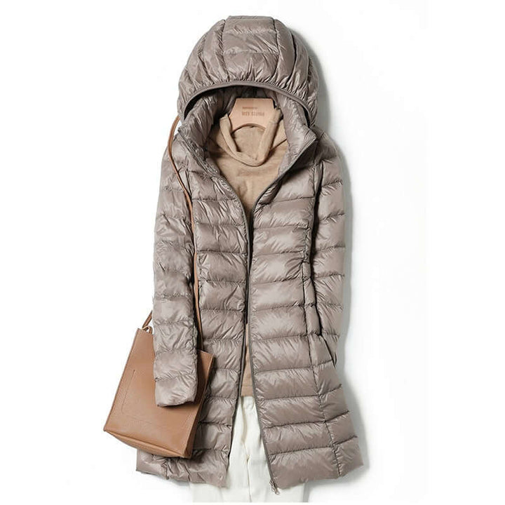 Warm zip-up casual winter jacket for women, ideal for everyday wear & light travel. Comfortable outerwear.