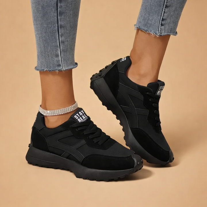 Close-up of the supportive sole on women's comfort athletic sneakers, ideal for urban trails.