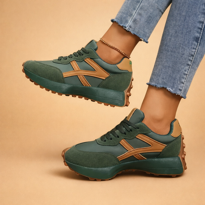 Side profile of women's fashion sneakers with breathable mesh, designed for comfort.
