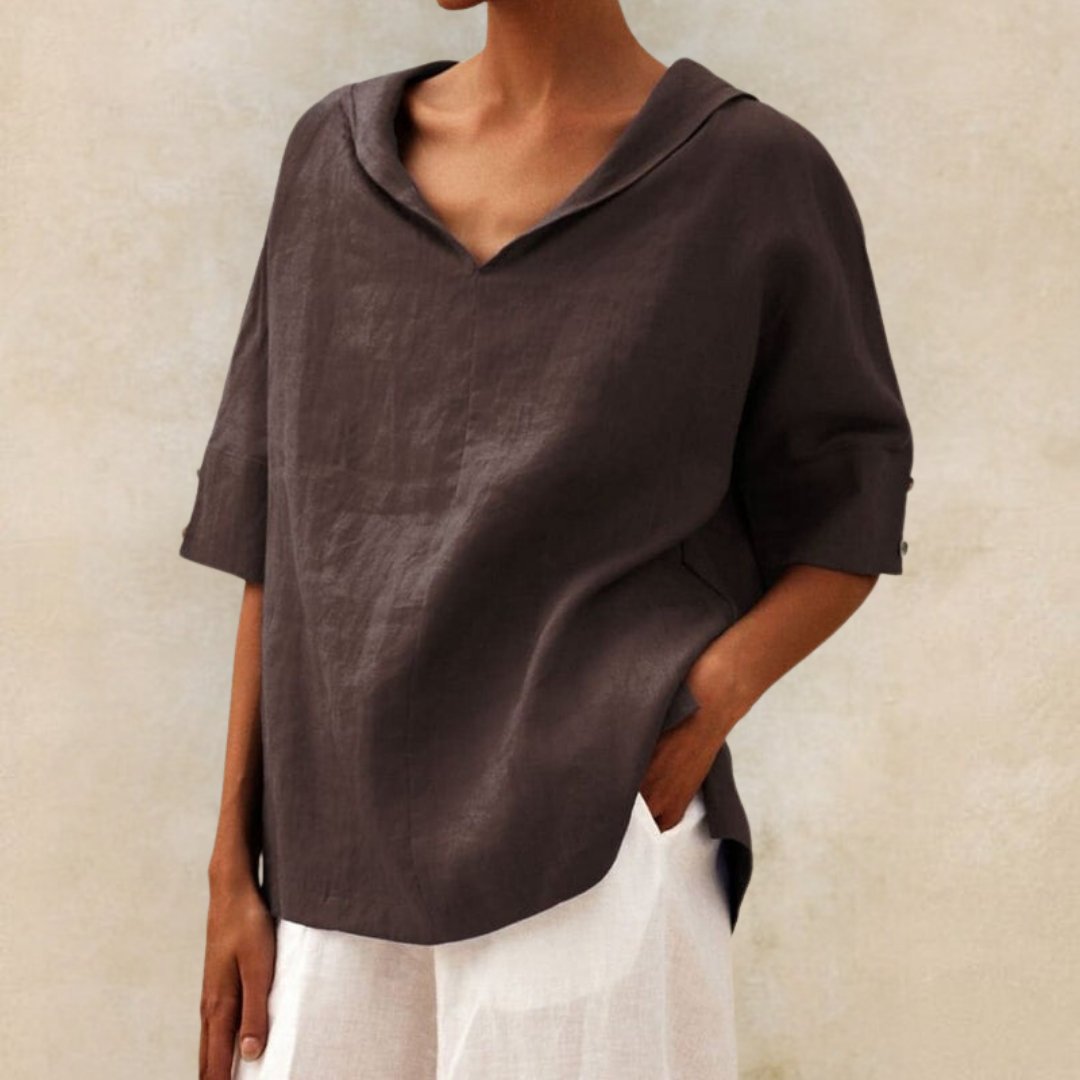 Casual women's V-neck summer top with comfortable relaxed fit and elbow sleeves for everyday fashion.