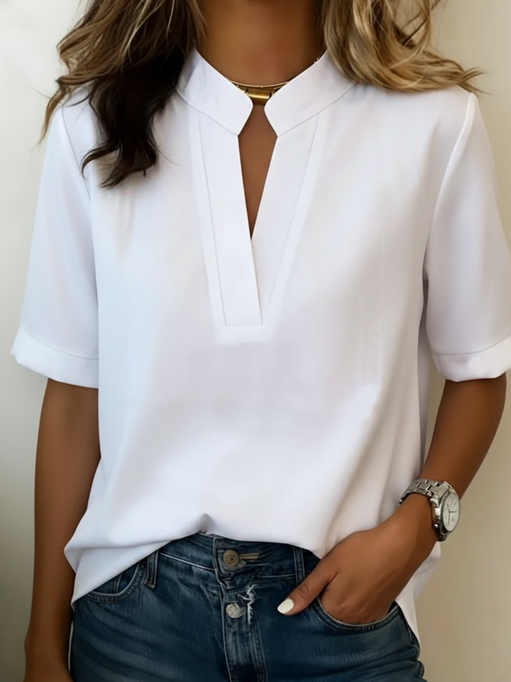 Elegant women's short sleeve V-neck top, a comfortable and versatile piece for any casual outfit.