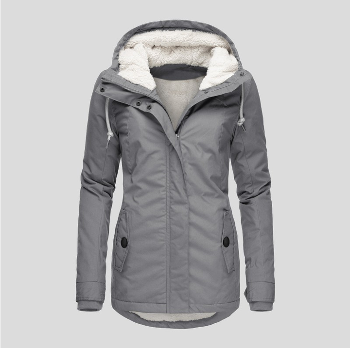 Chic women's stylish hooded winter jacket, featuring a flattering drawstring waist and practical pockets for daily wear.