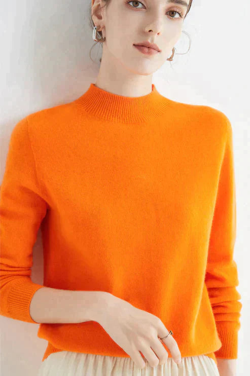 Stylish women's warm knit sweater, perfect for cozy autumn & winter fashion. Everyday casual long-sleeve jumper.