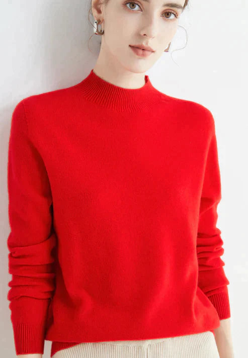 Close-up of a women's stylish warm knit sweater, featuring cozy texture. Perfect long-sleeve top for casual autumn.
