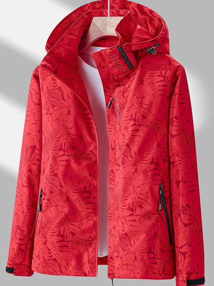 Close-up of a women's stylish hooded jacket with waterproof & windproof fabric for active outdoor use.