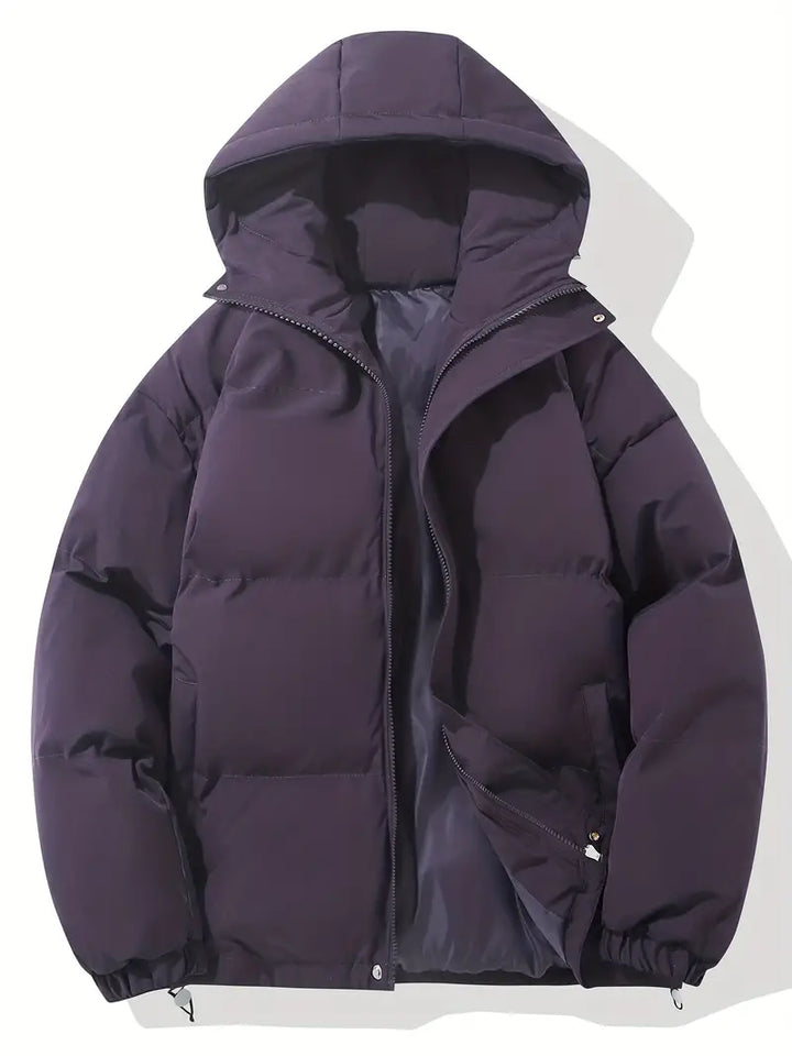 Chic women's winter jacket, offering stylish warmth with a protective hood for severe cold weather.