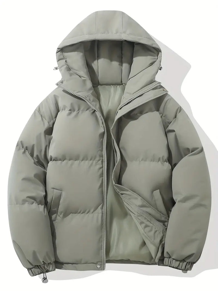 Elegant women's hooded parka, a classic winter jacket providing stylish warmth for cold weather days.