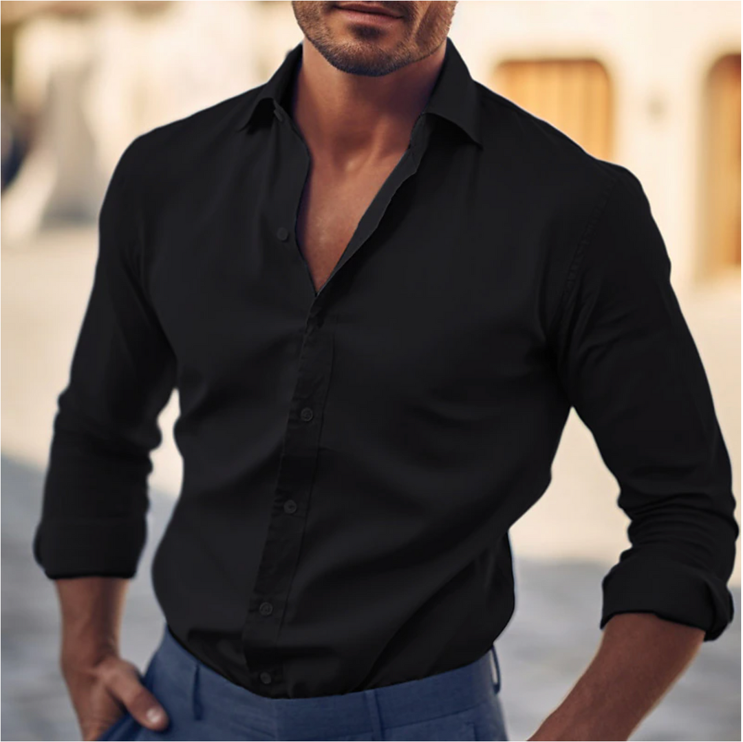 Sleek men's tailored fit long sleeve dress shirt. Classic collar for a sharp and professional silhouette.