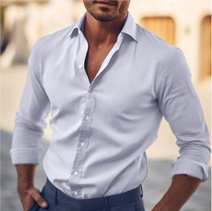Adaptable men's collared shirt, tailored fit. Long sleeve, transitions from business to evening wear.