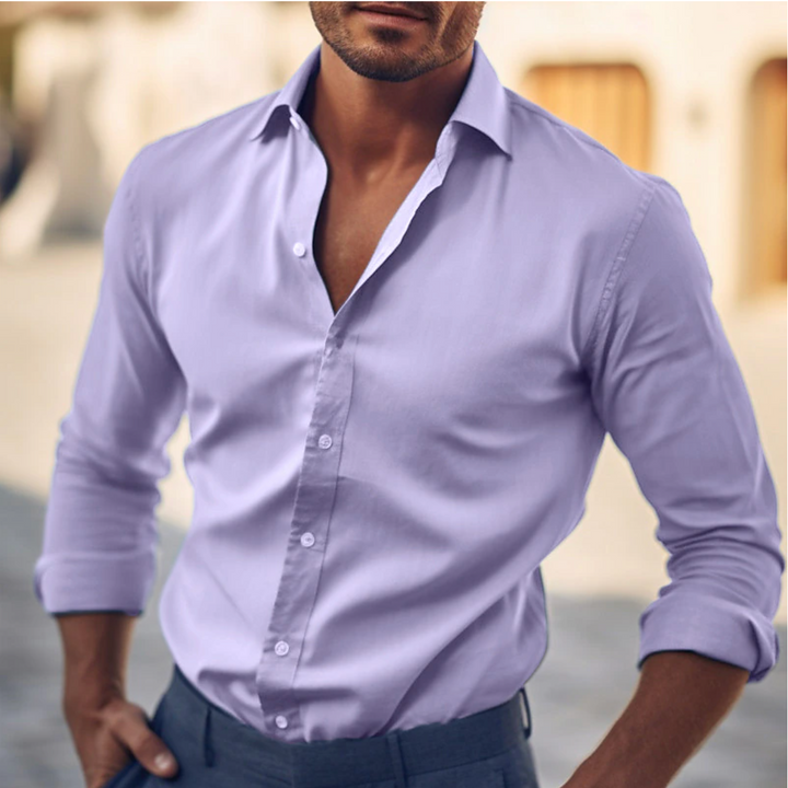 Essential men's long sleeve dress shirt, classic collar. Tailored fit for versatile and elegant formal wear.