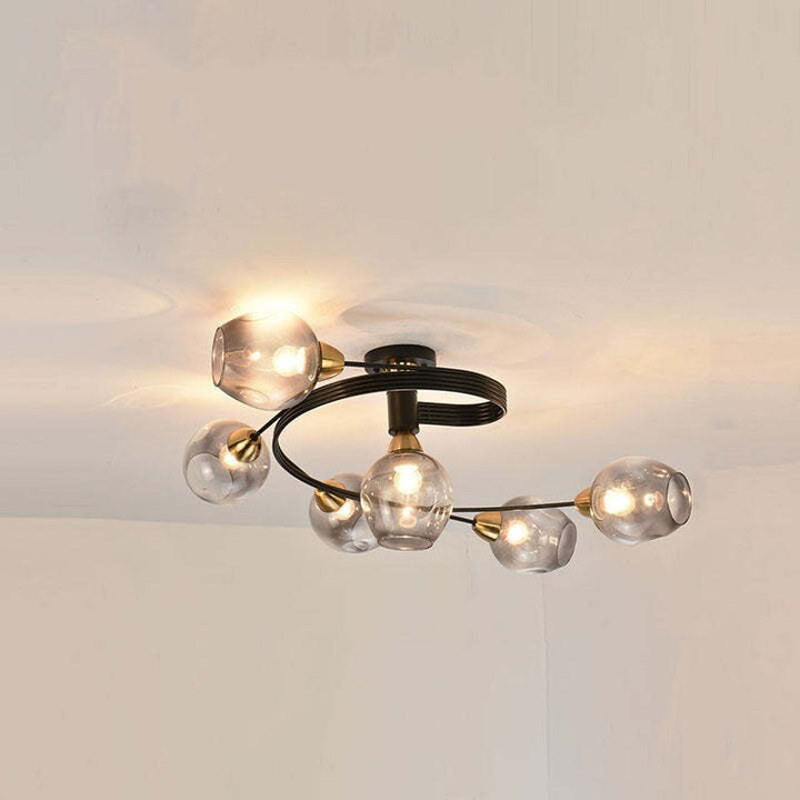 Gold Tavin Modern Flush Mount Ceiling Light; elegant, contemporary design for dining room.