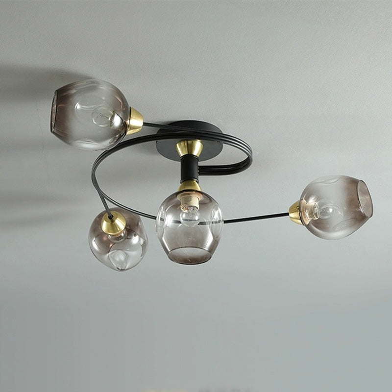 Modern amber flush mount ceiling lamp, ambient lighting for cozy living room decor.