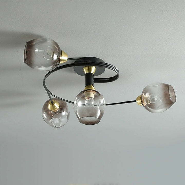 Modern amber flush mount ceiling lamp, ambient lighting for cozy living room decor.