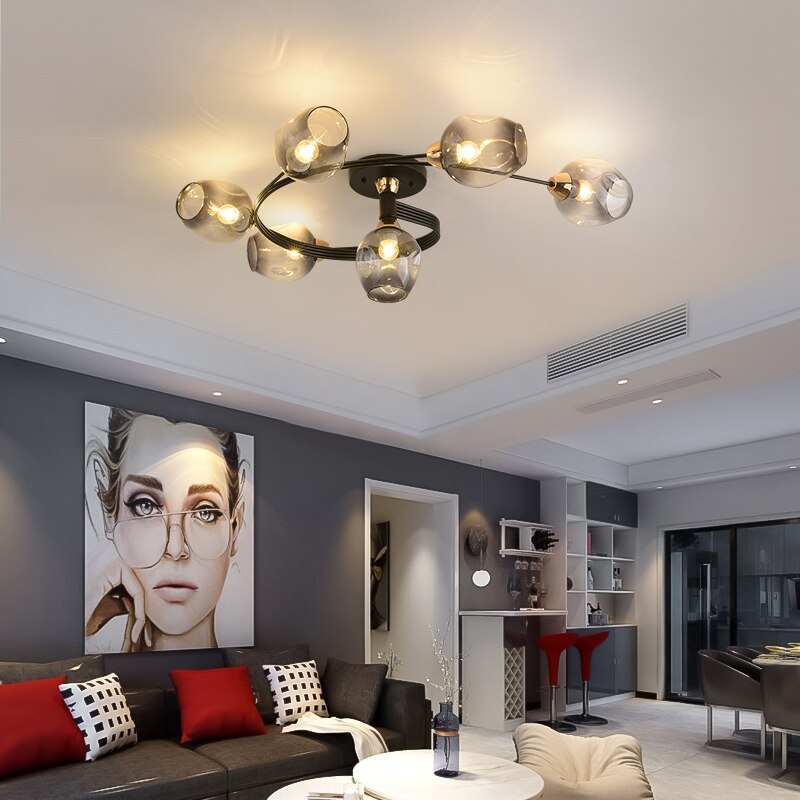 Sculptural Tavin flush mount ceiling light; modern design perfect for living room decor.