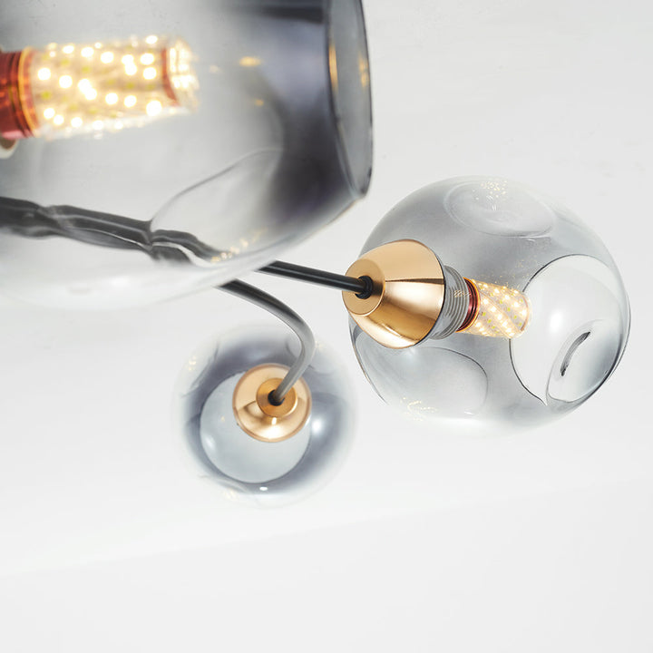 Stylish Tavin flush mount ceiling light; a sculptural, contemporary piece for home.