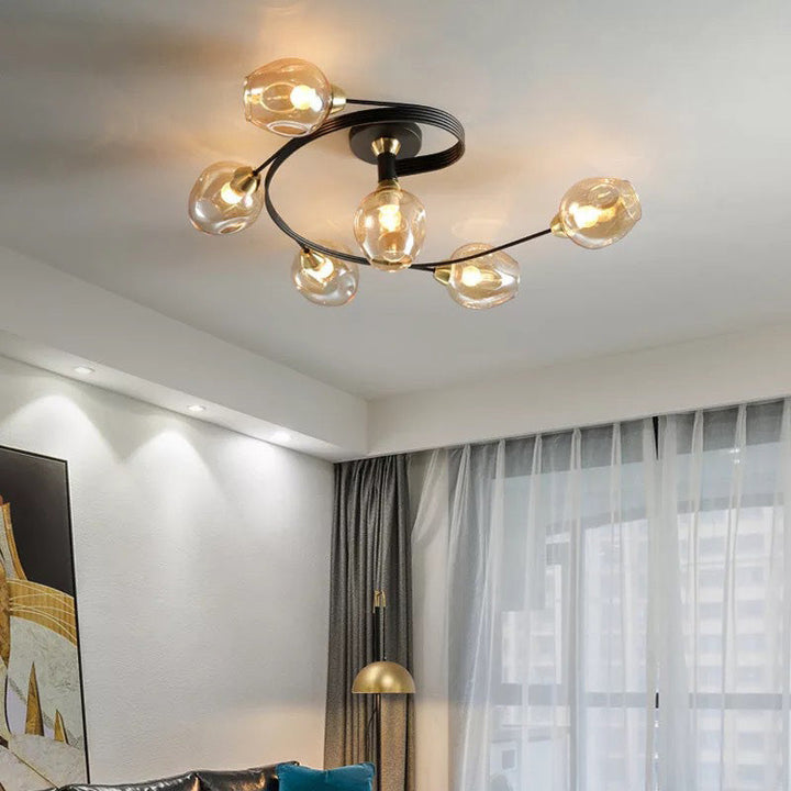 Black Tavin Modern Flush Mount Ceiling Light; sleek, contemporary design for a dining room.
