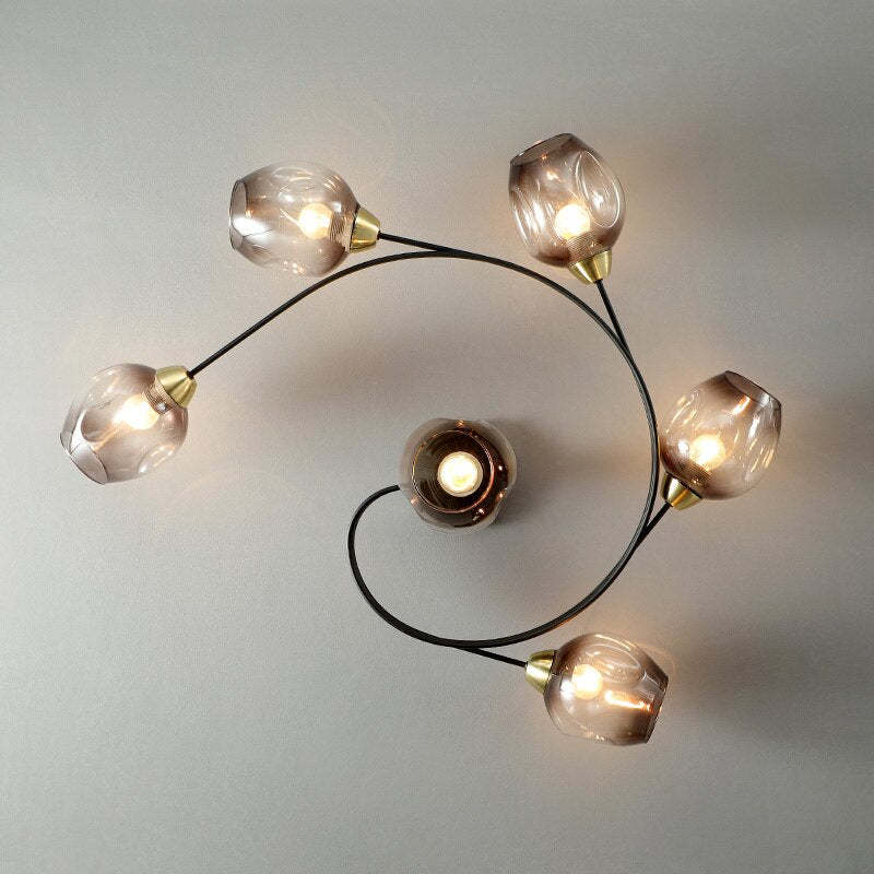 Modern black flush mount ceiling lamp, sophisticated lighting for contemporary living room.