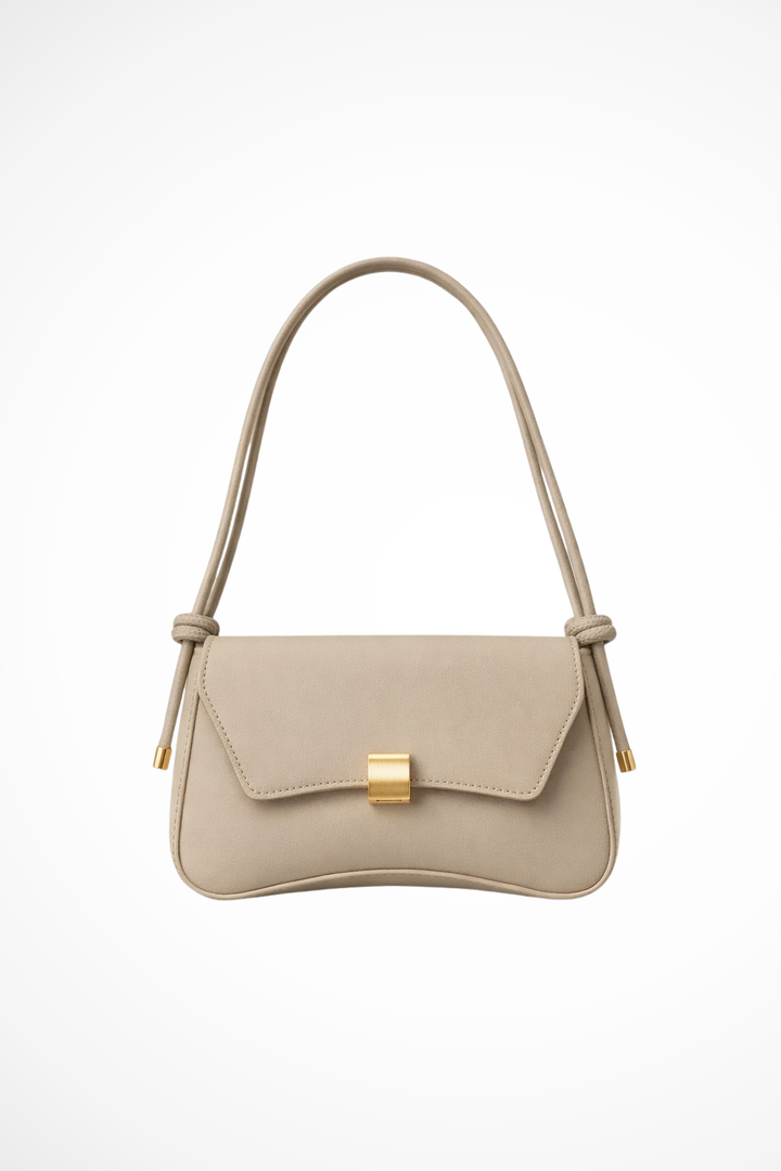 Terracotta minimalist shoulder bag with gold clasp & adjustable strap. Compact & elegant women's flap bag.