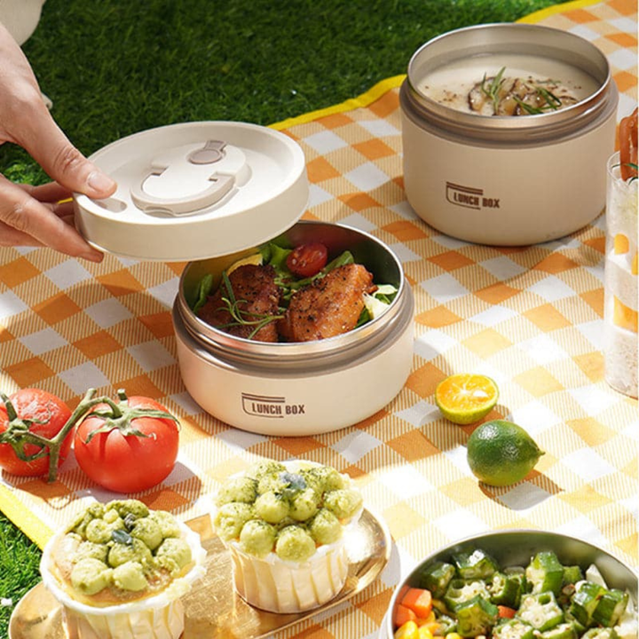 Blue insulated food container for school lunches, keeps food warm.