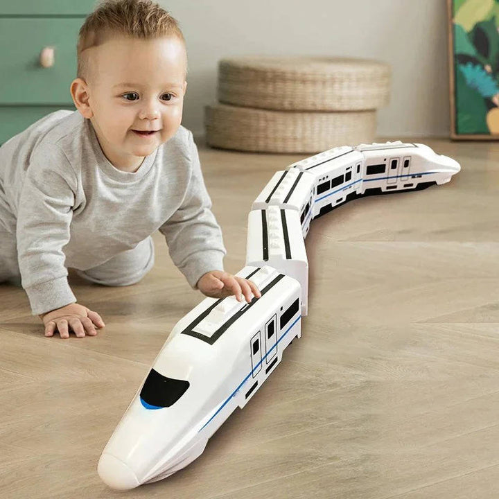 Close-up of toddler train set featuring colorful cars and interactive lights.