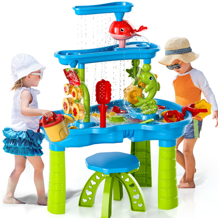 Toddler joyfully splashes and plays with colorful boats in a Children's Splash Fun Water Table in a sunny backyard.