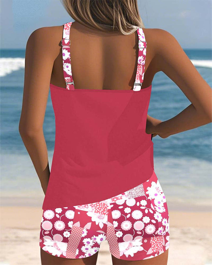 Comfortable women's printed two-piece swimsuit set. Stylish beachwear, perfect for trendy summer poolside fashion.