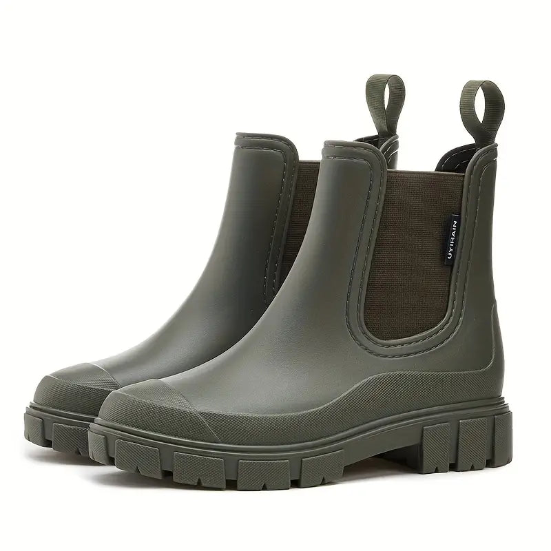 Chic women's rain boots with waterproof design. Trendy ankle boots offering stylish wet weather protection & comfort.