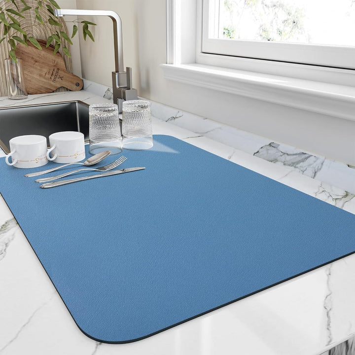 Sleek modern kitchen draining mat, fast-drying solution for dishes, glasses & utensils by the sink.