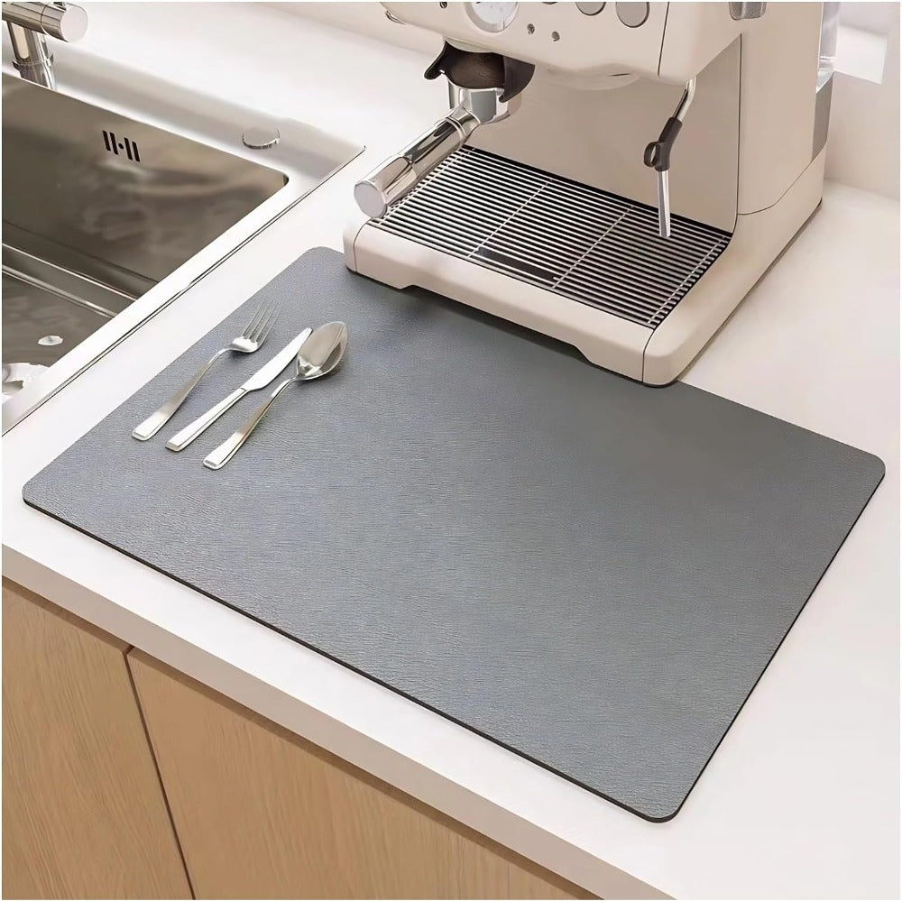 Compact quick-dry kitchen mat for worktop, keeps counters tidy while draining dishes, cups & cutlery.