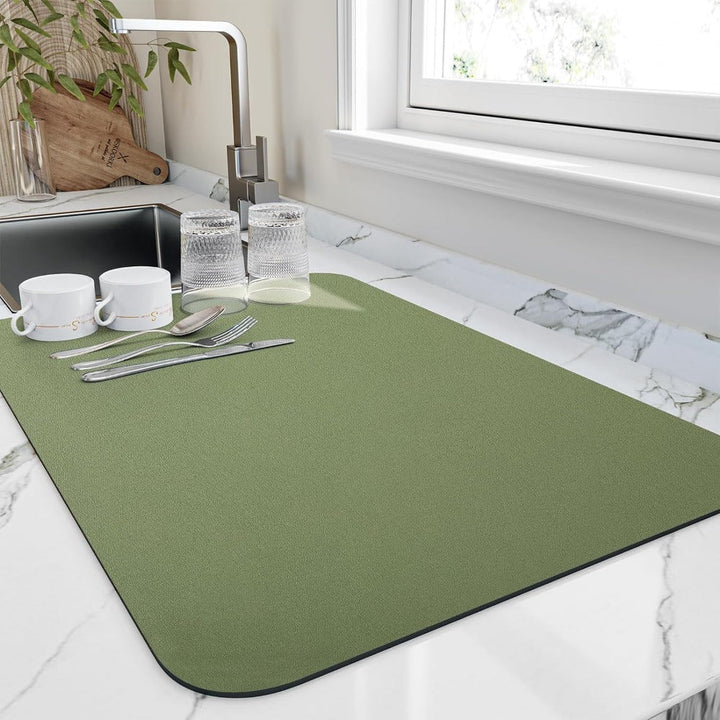 Durable quick-dry kitchen mat for dishes, pots & pans, an essential countertop protector & sink accessory.