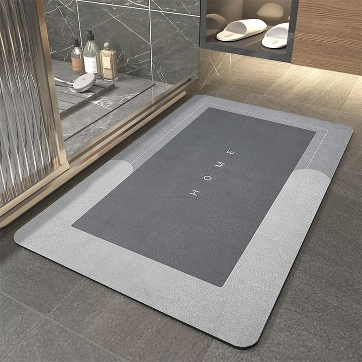 Stylish rectangular quick-dry bath mat, highly absorbent for bathroom comfort & safety.