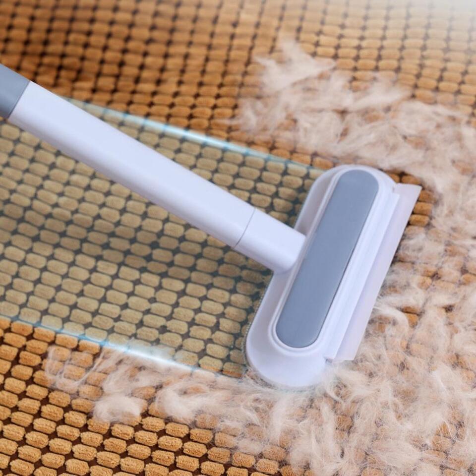 Compact Ultra Pet Hair Remover for quick and easy pet grooming and cleaning.