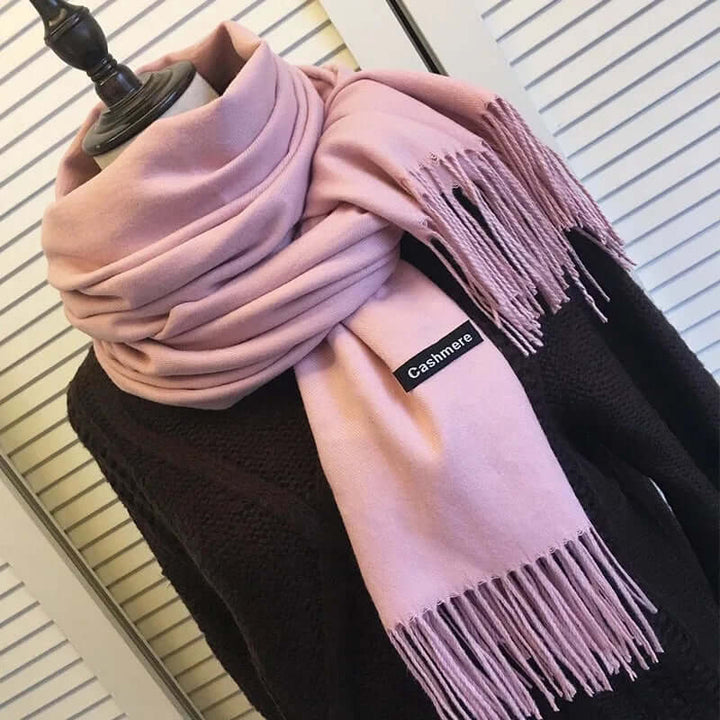 Ultra-soft luxury women's scarf, elegantly draped, a versatile fashion accessory.