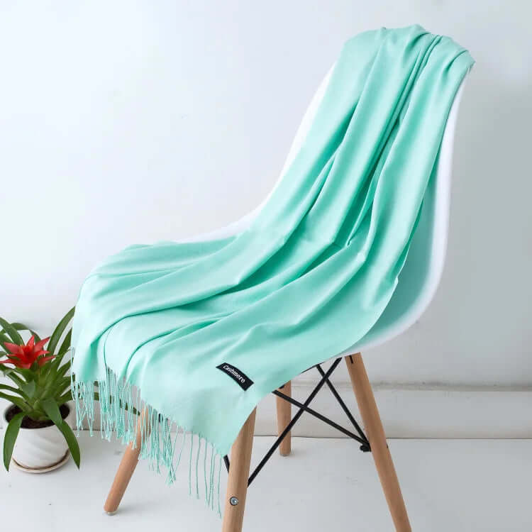 Neatly folded ultra-soft luxury women's scarf, an elegant gift for any occasion.