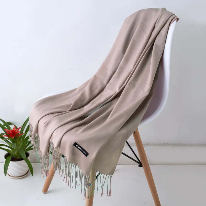 Elegant women's luxury scarf displayed, showcasing its ultra-soft drape and style.