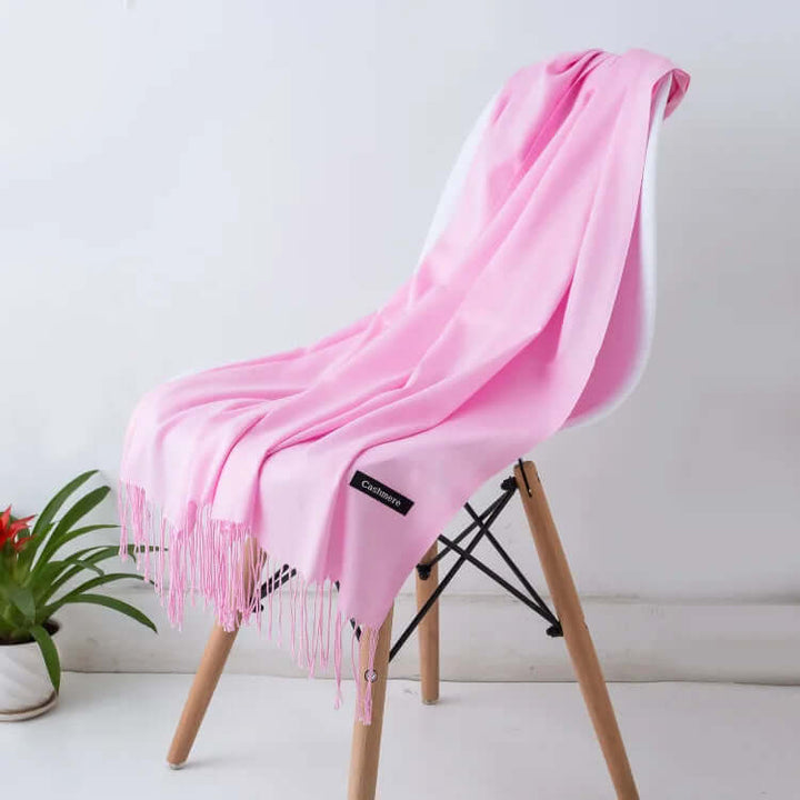 Side view of an ultra-soft luxury women's scarf, showing its elegant design & texture.