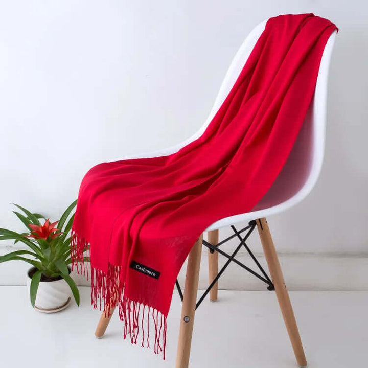 Detail of the ultra-soft texture on a luxurious women's fashion scarf, premium feel.
