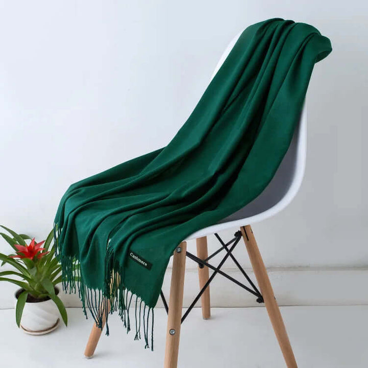 Ultra-soft women's luxury scarf under natural light, emphasizing its gentle drape.