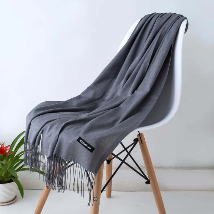 Elegant ultra-soft women's luxury scarf styled on a mannequin, a chic accessory.
