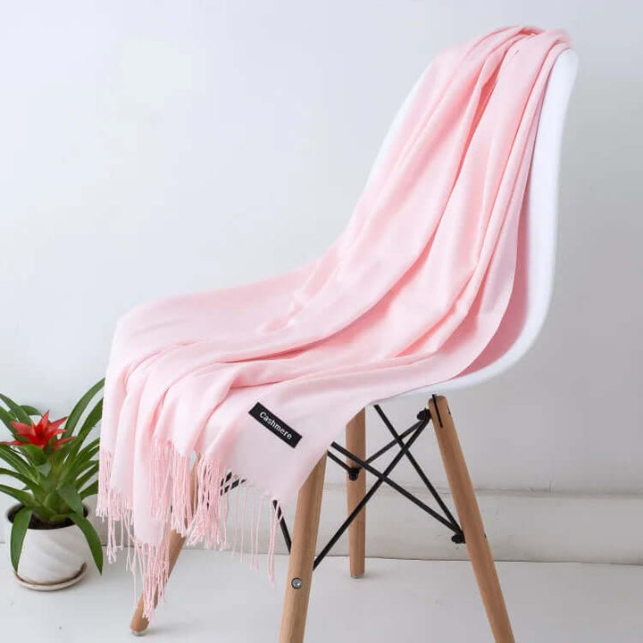 Ultra-soft luxury women's scarf gently flowing, an elegant and versatile accessory.