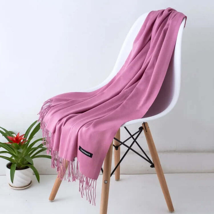 Versatile luxury women's scarf, ultra-soft and chic, enhancing any elegant outfit.